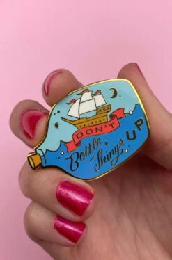 Don't Bottle Things Up Enamel Pin By Erstwilder