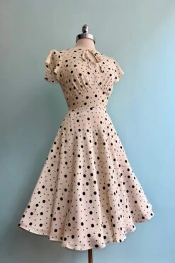 Cream And Black Polka Dot Flutter Sleeve Dress By Voodoo Vixen 6 Cream And Black Polka Dot Flutter Sleeve Dress By Voodoo Vixen -MODERN MILLIE Shop 0D65E6E9 45A0 4598 83A1 2725A304B569