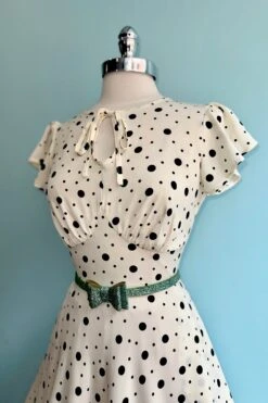 Cream And Black Polka Dot Flutter Sleeve Dress By Voodoo Vixen 5 Cream And Black Polka Dot Flutter Sleeve Dress By Voodoo Vixen -MODERN MILLIE Shop 1738E4B9 EC41 4022 9F5C 05B2AF462C03