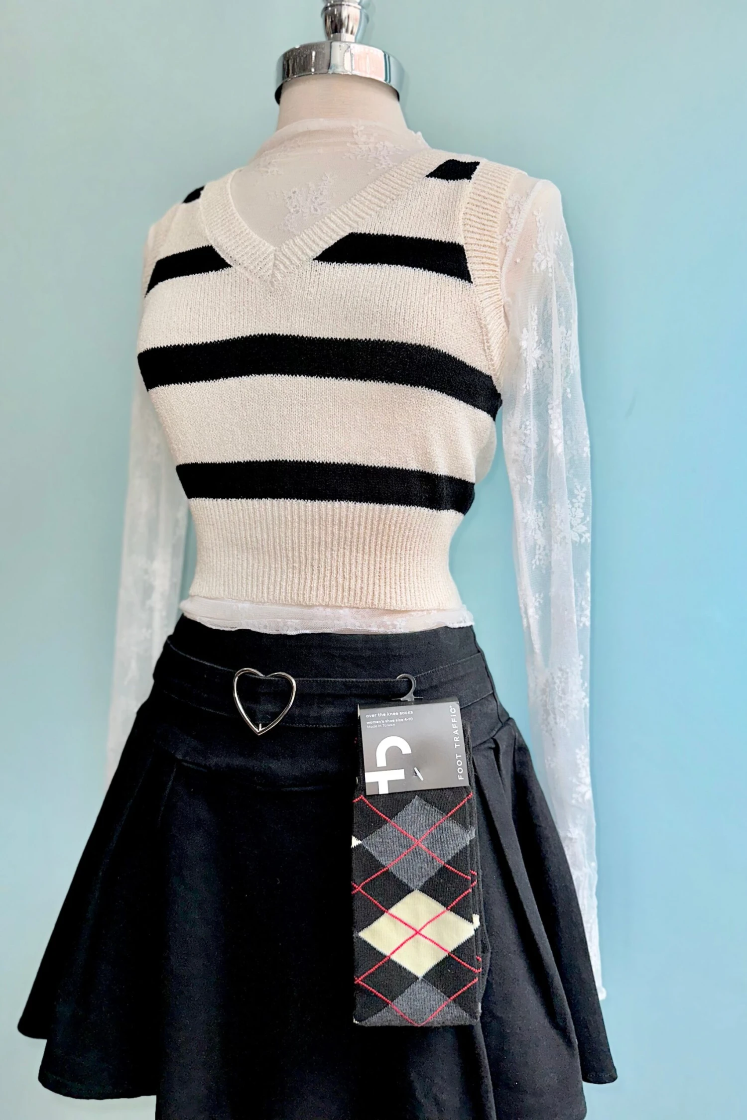 Black Pleated Denim Mini Skirt with a Heart Buckle by Jawbreaker Black Pleated Denim Mini Skirt With A Heart Buckle By Jawbreaker -MODERN MILLIE Shop 20656BBF C8FA 4BBE A408 F1933BF4D10F scaled