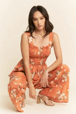 Orange Daisy Smocked Wide Leg Jumpsuit -MODERN MILLIE Shop 27fe0f37808b19cdeae8473451bf89d7beaf1189e86674ca81d82d8a0967150a