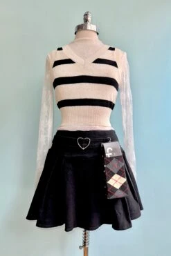 Black Pleated Denim Mini Skirt With A Heart Buckle By Jawbreaker 4 Black Pleated Denim Mini Skirt With A Heart Buckle By Jawbreaker -MODERN MILLIE Shop 330A182A C98C 4EAD 9E98 A9FE1626CBE6