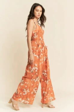 Orange Daisy Smocked Wide Leg Jumpsuit -MODERN MILLIE Shop 392003e2b30c4784f285711eadc1880dc2f55b30bc04e394e9fcbeef46836e74