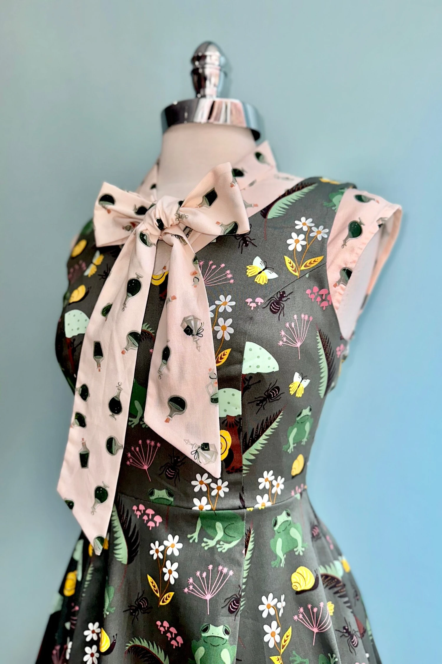 Potion Bottle Bow Top by Retrolicious Potion Bottle Bow Top By Retrolicious -MODERN MILLIE Shop 39AC4C2D 57B1 4017 8967 1F49E00BB27B scaled