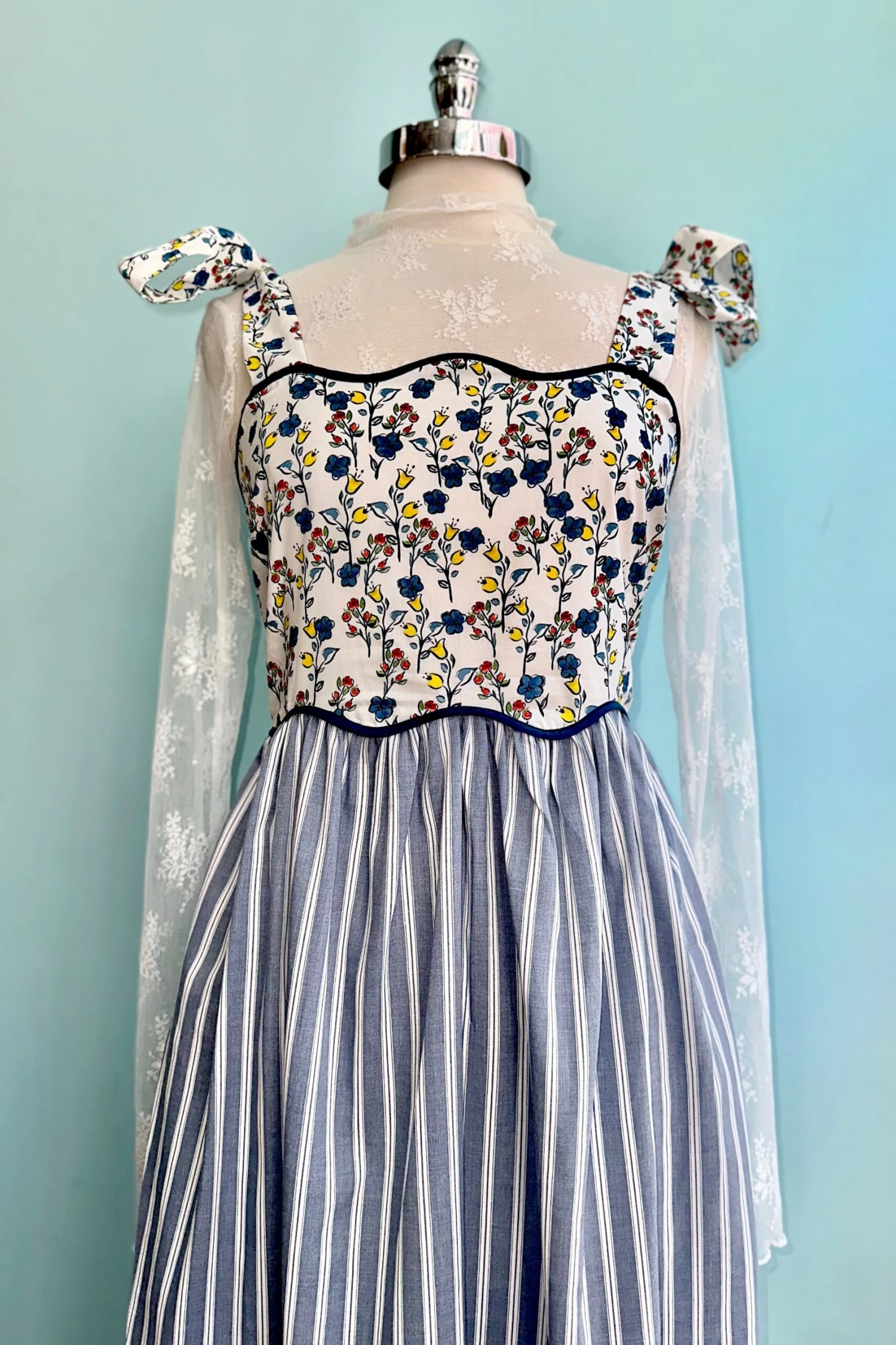 Blue Floral and Striped Print Midi Dress Blue Floral And Striped Print Midi Dress -MODERN MILLIE Shop 509123C9 0E46 4252 9A93 A2FE5FBC250D scaled