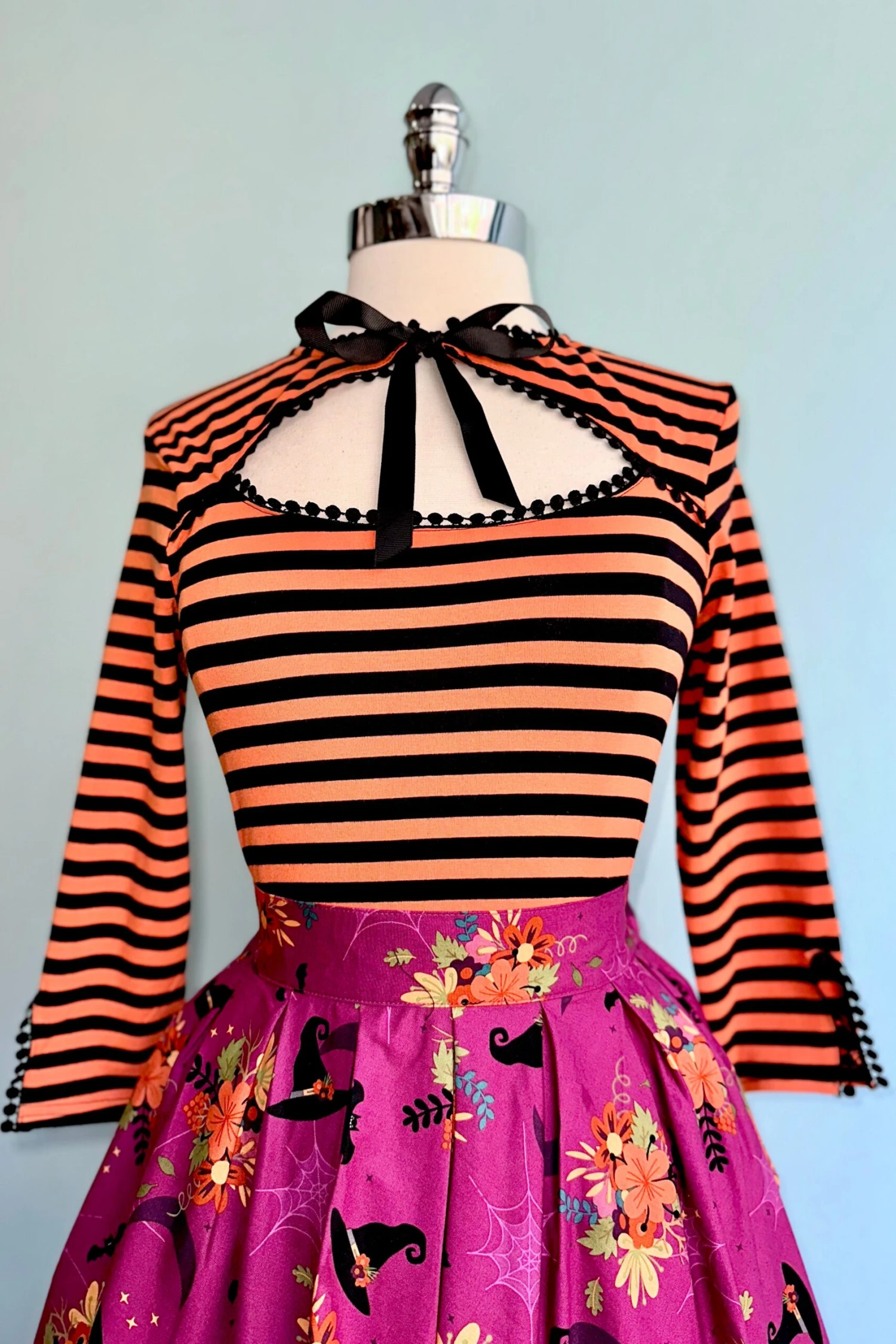 Black and Orange Striped Cut-Out Neck Top Black And Orange Striped Cut-Out Neck Top -MODERN MILLIE Shop 52D13318 675B 4A0D 9613 C5B39FE439E6 scaled