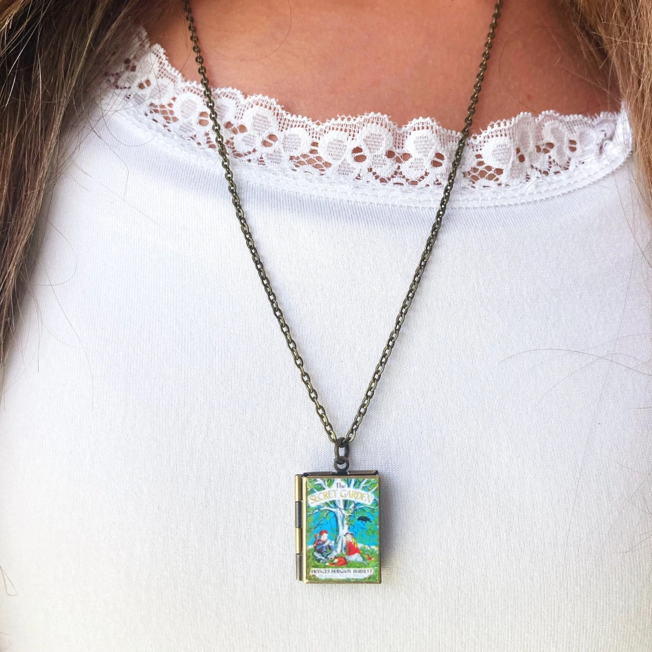 The Secret Garden Book Locket Necklace by Marshall and Rose The Secret Garden Book Locket Necklace By Marshall And Rose -MODERN MILLIE Shop 5a8ebca70ebdf629088190a8a6754a72a57e8e4e38d43c871c5c50bd63cc513a