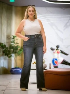 Double Button High Waisted Bootcut Jeans By Artemis Vintage -MODERN MILLIE Shop 5bd2562b0586ab6c57248b2fce5faa083623ef51bf786f699f971fee29dce797