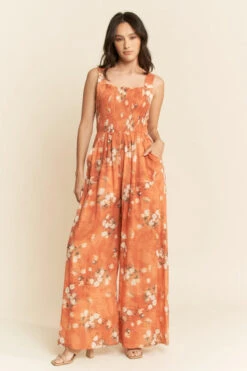 Orange Daisy Smocked Wide Leg Jumpsuit -MODERN MILLIE Shop 633a037a58c4b78a8b71570ea7f3a00ed4917e356ec81893a43101ff3caf8dc7