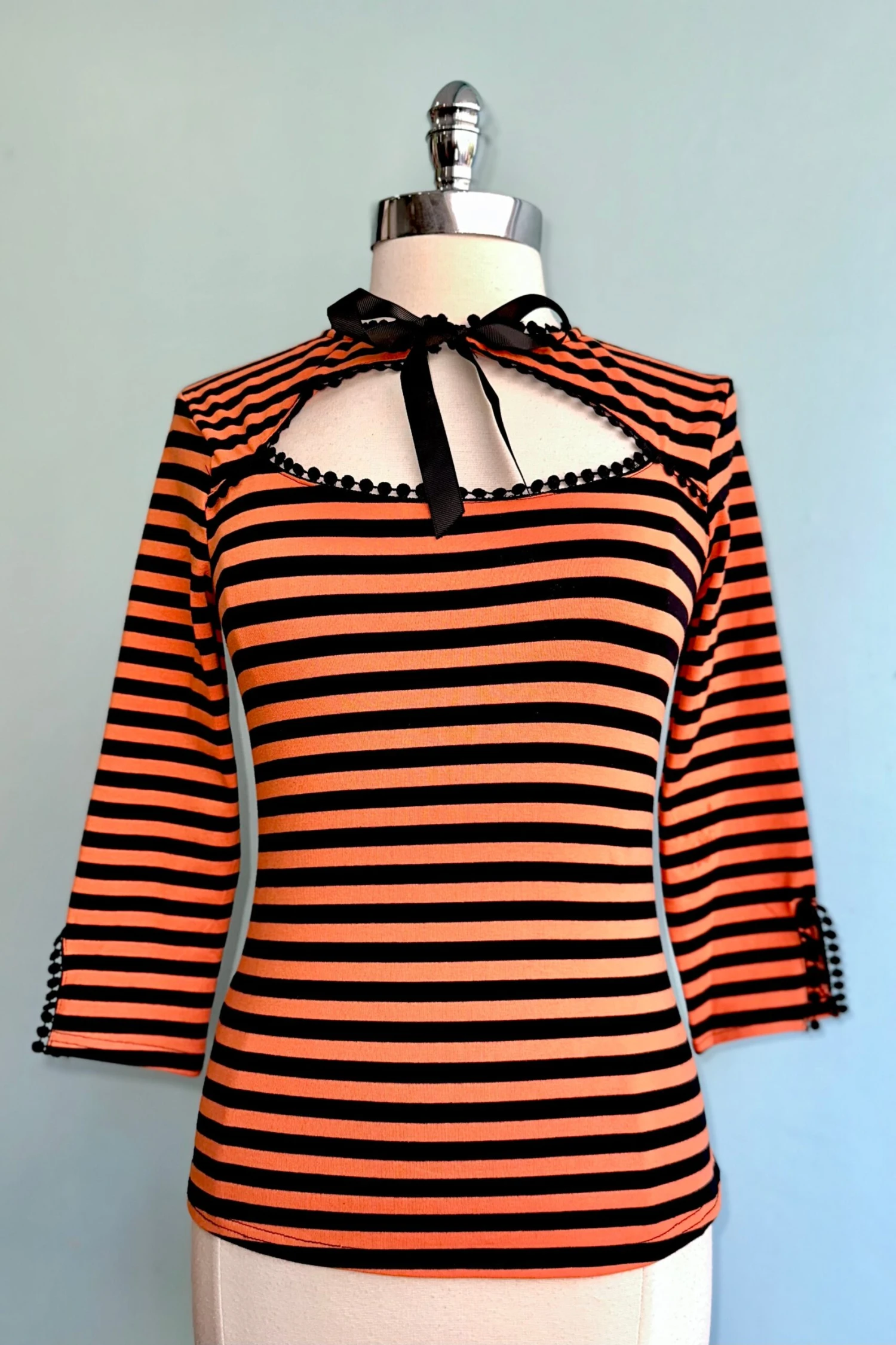 Black and Orange Striped Cut-Out Neck Top Black And Orange Striped Cut-Out Neck Top -MODERN MILLIE Shop 7054E0A9 0482 44BC A32C 4B08FFC68D98 scaled