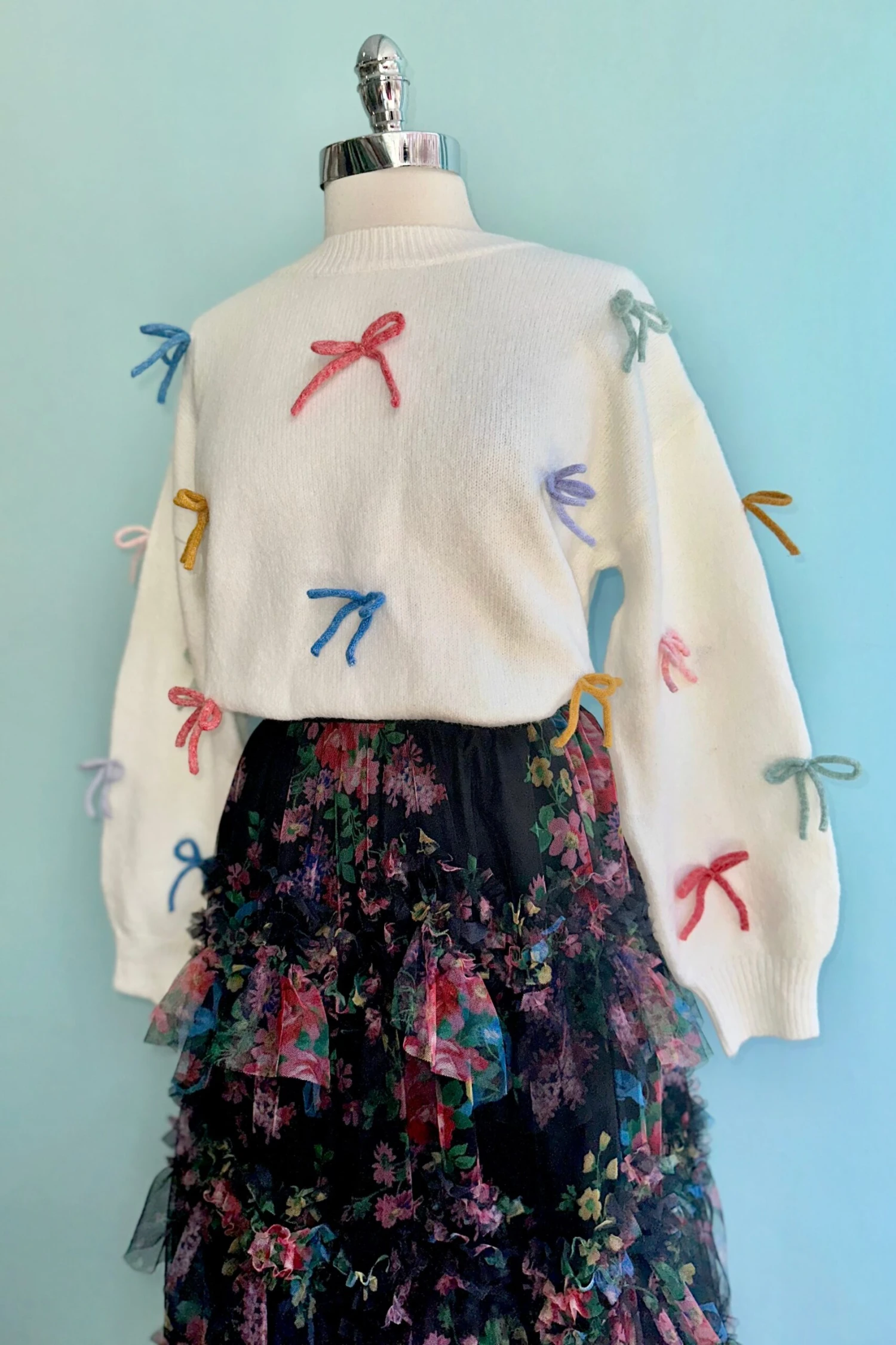 All Over Bow Knit Sweater in Ivory All Over Bow Knit Sweater In Ivory -MODERN MILLIE Shop 726EA9F6 5AFD 4CE9 9D2C D44BD5E02882 scaled