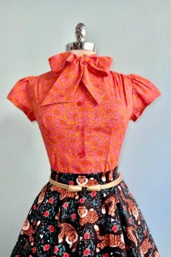 Orange And Pink Mod Daisy Estelle Tie-Neck Blouse By Heart Of Haute -MODERN MILLIE Shop 7CD18A1A 0A80 4FCD B6FB 1E66B2864E73