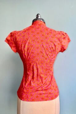 Orange And Pink Mod Daisy Estelle Tie-Neck Blouse By Heart Of Haute -MODERN MILLIE Shop 81AF2B24 2908 4D9E 8B3C 579136DAA512