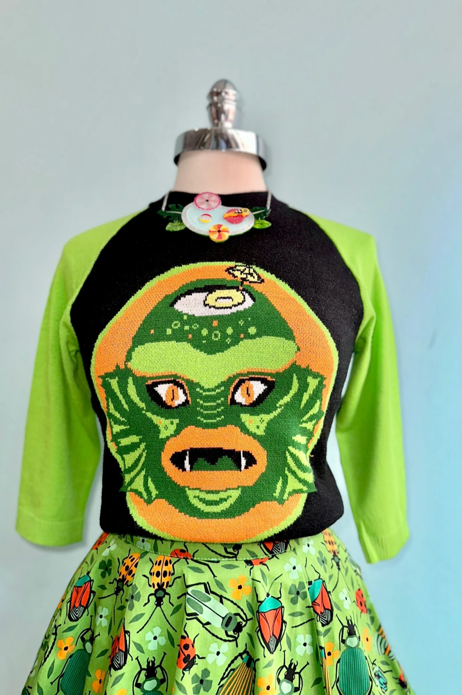 Swamp Creature Tiki Mug Sweater by The Oblong Box Shop Swamp Creature Tiki Mug Sweater By The Oblong Box Shop -MODERN MILLIE Shop 858AA819 E30B 4D79 8090 E09B30DACFF4 scaled