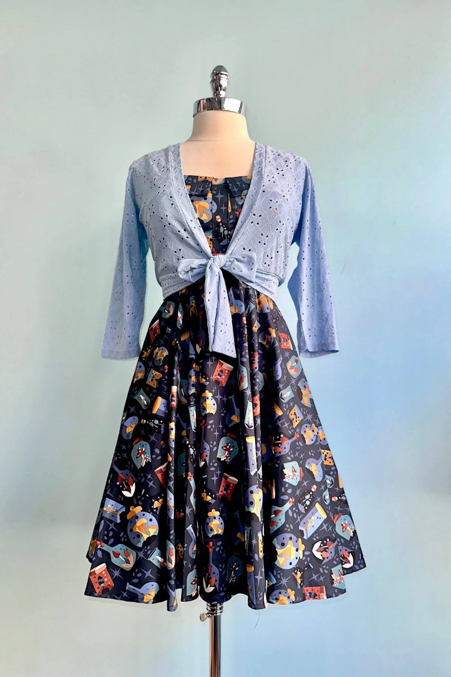 Mushrooms and Potions Fold-Over Dress by Eva Rose Mushrooms And Potions Fold-Over Dress By Eva Rose -MODERN MILLIE Shop 9588FB13 CA6F 45BC 8F94 2AC172307964 scaled