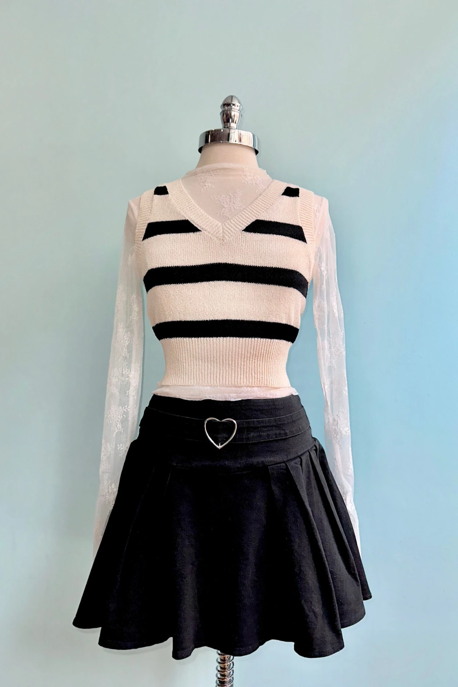 Black Pleated Denim Mini Skirt with a Heart Buckle by Jawbreaker Black Pleated Denim Mini Skirt With A Heart Buckle By Jawbreaker -MODERN MILLIE Shop 9A82FEDF ABF1 40FC 9F2B 7C57EECA773D scaled