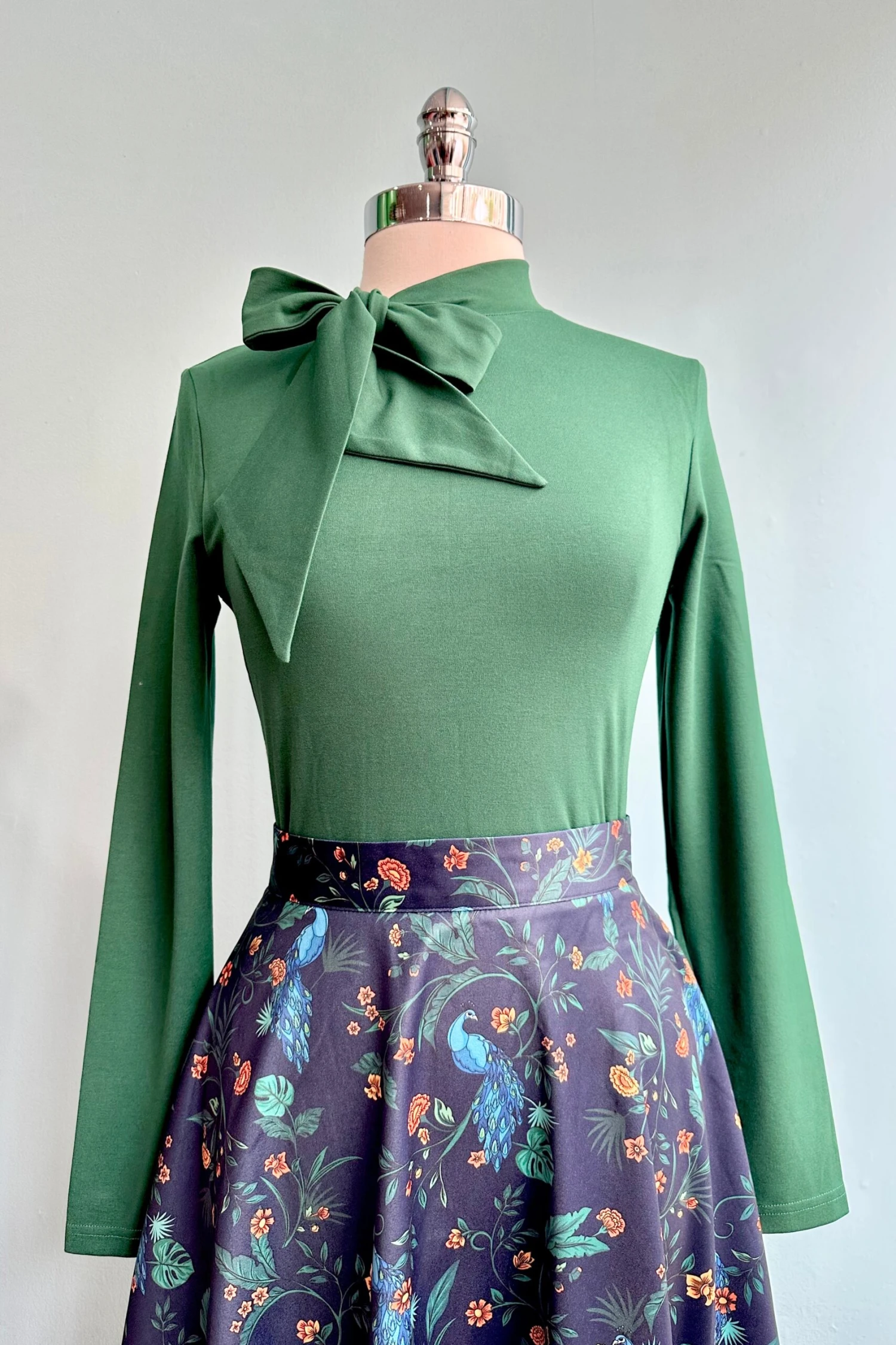 Green Tie Neck Jersey Top by Voodoo Vixen Green Tie Neck Jersey Top By Voodoo Vixen -MODERN MILLIE Shop 9B2CAC75 7588 4E6D 956B E113C75EC438 scaled