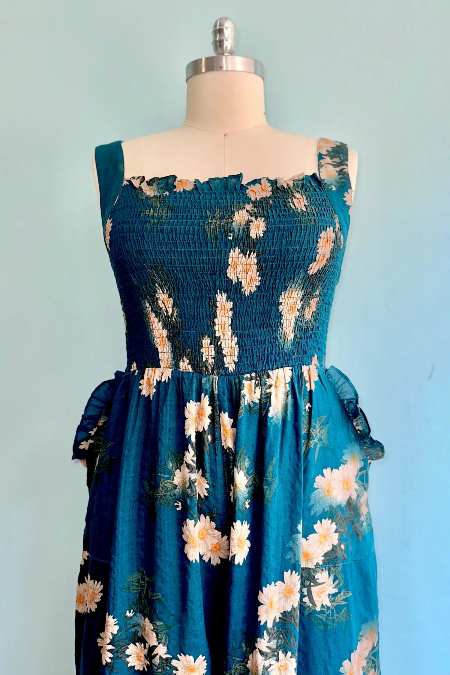 Daisy Smocked Wide Leg Jumpsuit in Midnight Blue Daisy Smocked Wide Leg Jumpsuit In Midnight Blue -MODERN MILLIE Shop A2F66343 8269 4A6E A88E 3B4C9BF85A3C scaled