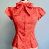Orange And Pink Mod Daisy Estelle Tie-Neck Blouse By Heart Of Haute