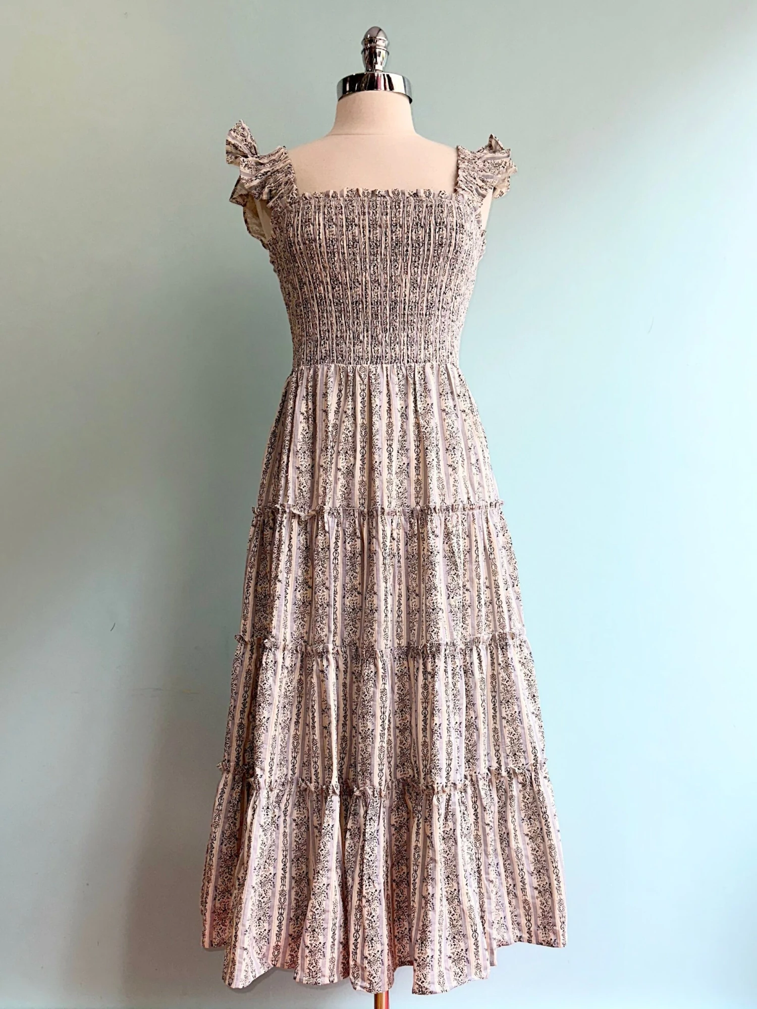 Floral and Striped Smocked Ruffle Sleeve Midi Dress Floral And Striped Smocked Ruffle Sleeve Midi Dress -MODERN MILLIE Shop C9BD5A3D 0847 4401 AAC4 A2102EA28032 scaled