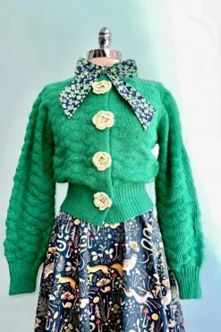 Green Knit Cardigan With Rosette Detail 4 Green Knit Cardigan With Rosette Detail -MODERN MILLIE Shop CF7643BF 8E62 468A AD75 DDEBEC623802
