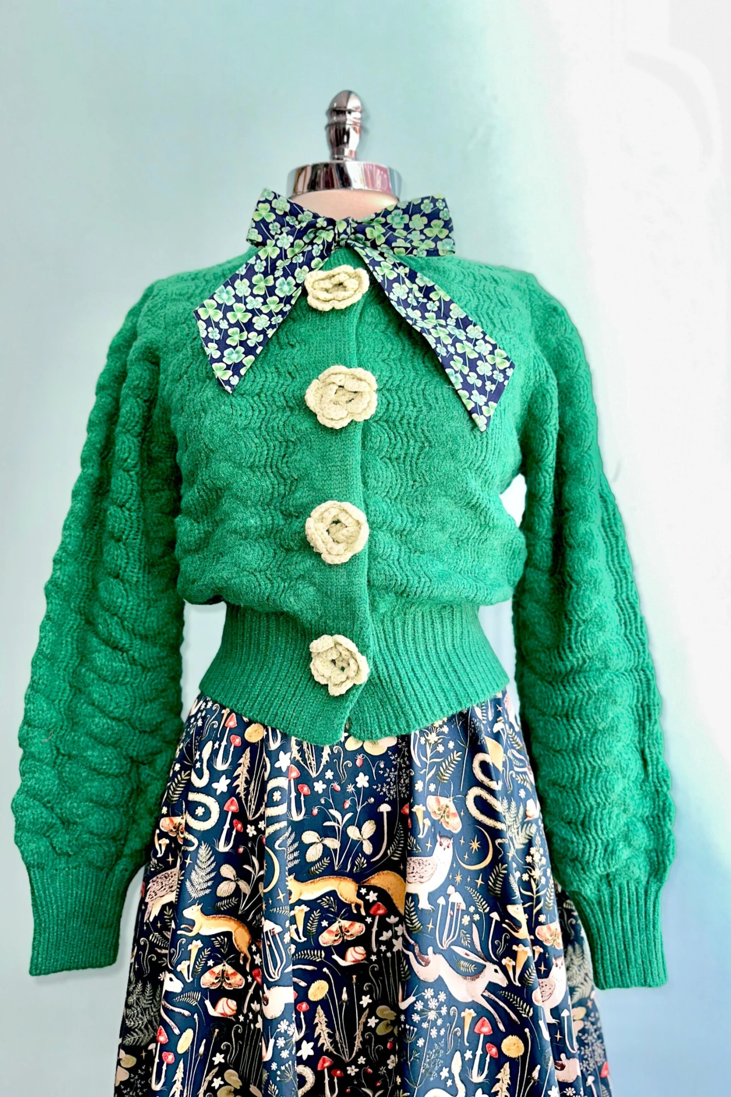 Green Knit Cardigan with Rosette Detail Green Knit Cardigan With Rosette Detail -MODERN MILLIE Shop CF7643BF 8E62 468A AD75 DDEBEC623802 scaled