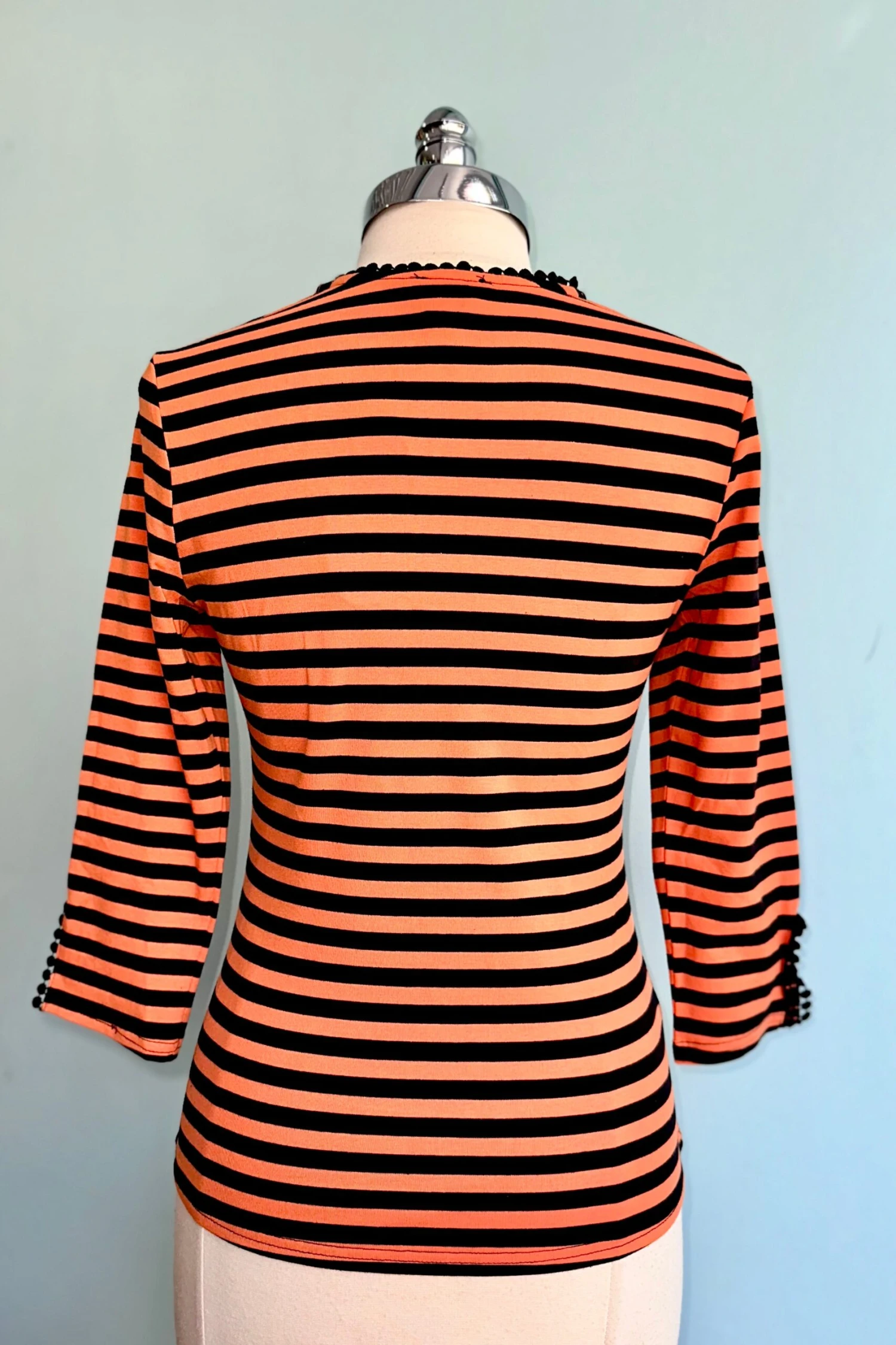 Black and Orange Striped Cut-Out Neck Top Black And Orange Striped Cut-Out Neck Top -MODERN MILLIE Shop D1C74EC3 1F80 4190 BD78 DC958D0A76B6 scaled