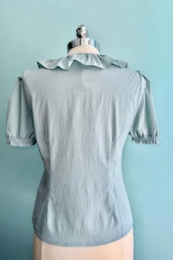 Ruffle Collar Puff Sleeve Top In Light Blue By Banned 7 Ruffle Collar Puff Sleeve Top In Light Blue By Banned -MODERN MILLIE Shop D2CBAC6F C21B 4406 8B86 4C0AB768A38E