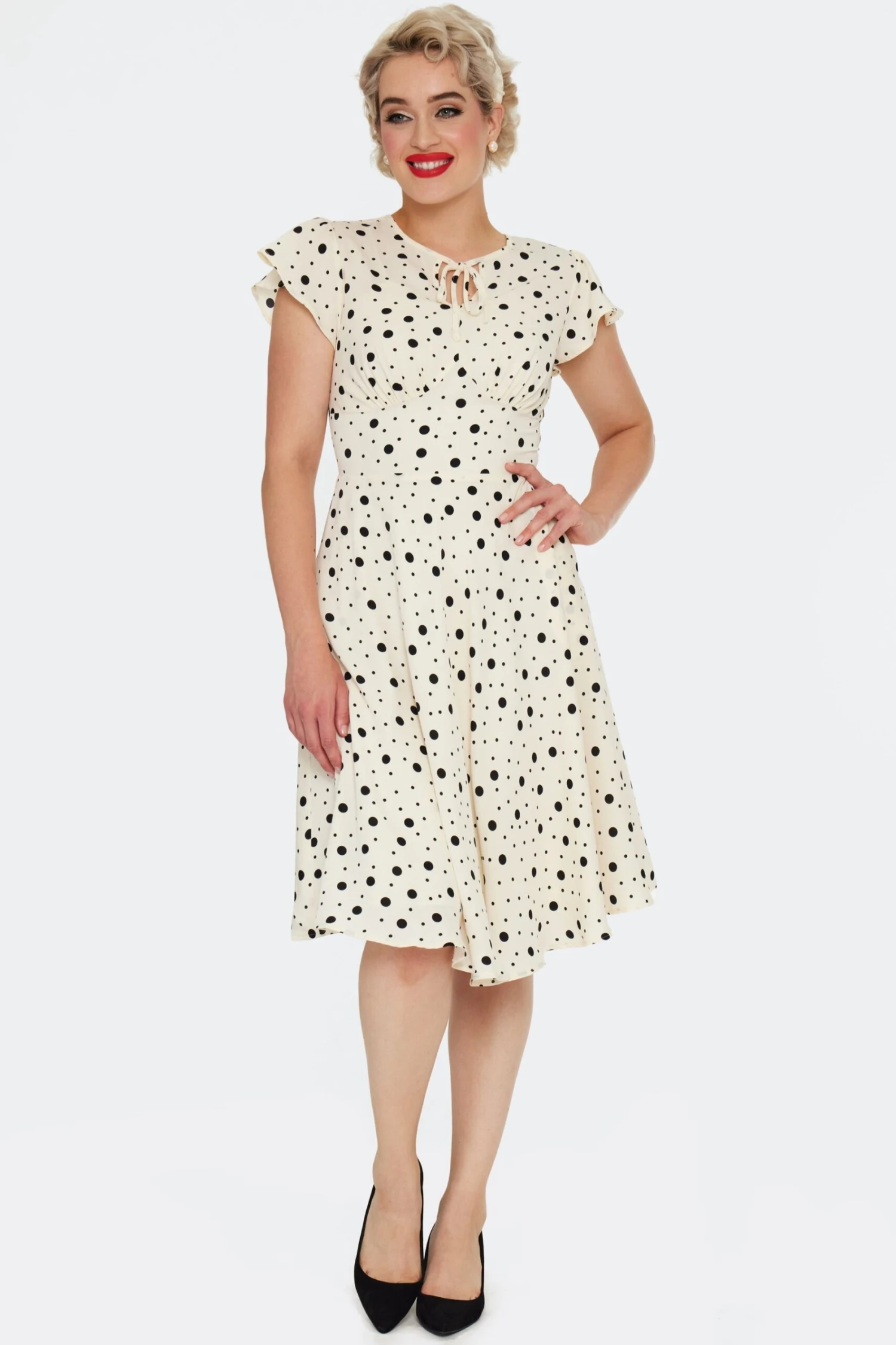 Cream and Black Polka Dot Flutter Sleeve Dress by Voodoo Vixen Cream And Black Polka Dot Flutter Sleeve Dress By Voodoo Vixen -MODERN MILLIE Shop DRA10112 CRE 01 scaled