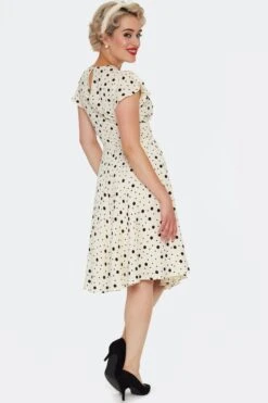 Cream And Black Polka Dot Flutter Sleeve Dress By Voodoo Vixen 11 Cream And Black Polka Dot Flutter Sleeve Dress By Voodoo Vixen -MODERN MILLIE Shop DRA10112 CRE 02