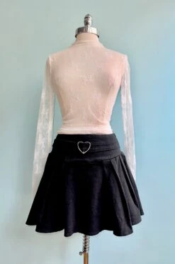 Off-White Mesh Long Sleeve Mock Neck Sheer Top -MODERN MILLIE Shop E313F440 5062 4A9B B850 3EEC82B811AC