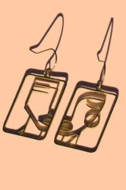 Two Faced Earrings By Peter And June