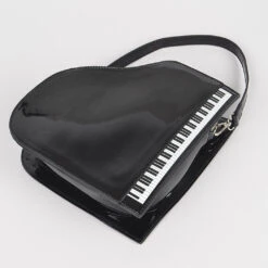 Grand Piano Handbag -MODERN MILLIE Shop a93a7f79fe6e88eb0c0ce82fb53cbfbd4189836f8b5e679117bdf8519518f71d
