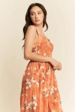 Orange Daisy Smocked Wide Leg Jumpsuit -MODERN MILLIE Shop b74bdbc962d67bb9156cc6ecf0b749ea0649116727f2f7c12115921a489db3be