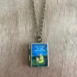 Nancy Drew Secret Of The Old Clock Book Locket Necklace By Marshall And Rose -MODERN MILLIE Shop e1bcddfc5cf1d61605044bd0e36fbebac77a1117f604b2ad68d52c1dc65eb252