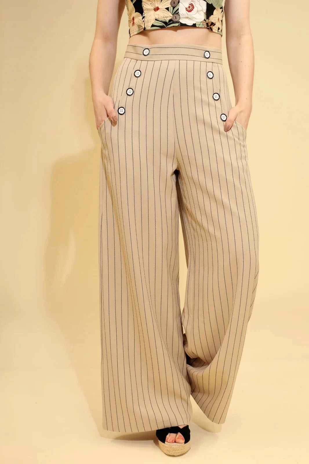 Beige Caspian Wide Leg Pants by Hell Bunny Beige Caspian Wide Leg Pants By Hell Bunny -MODERN MILLIE Shop h50310 caspian swing trousers beige 01 large 1 1 24ab8ab9 1333 465a 8996 42721c25ca2c