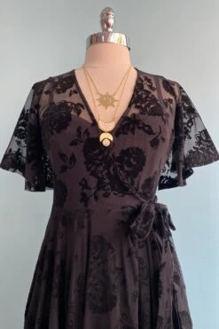 Lydia Wrap Dress In Black Flocked Rose Mesh By Wax Poetic 8 Lydia Wrap Dress In Black Flocked Rose Mesh By Wax Poetic -MODERN MILLIE Shop image 380242b6 9cc9 4155 9e6d 1995a06f5b05