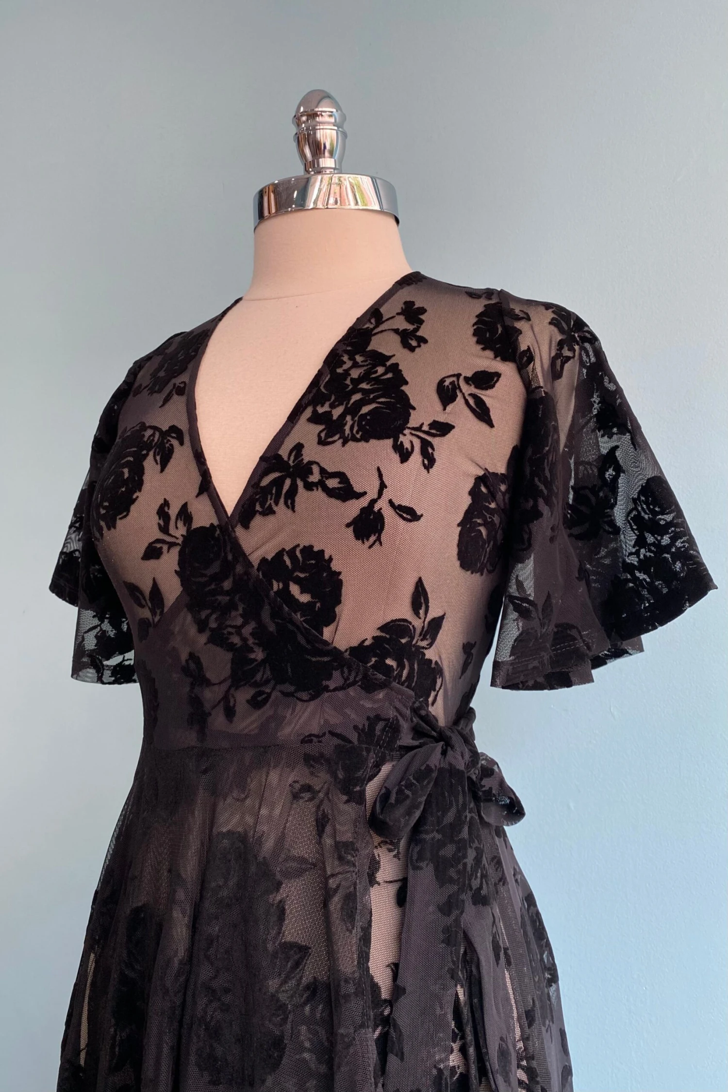 Lydia Wrap Dress in Black Flocked Rose Mesh by Wax Poetic Lydia Wrap Dress In Black Flocked Rose Mesh By Wax Poetic -MODERN MILLIE Shop image 8a35b3ab 3a5c 4d3e be09 833c626df348 scaled