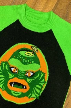 Swamp Creature Tiki Mug Sweater By The Oblong Box Shop 4 Swamp Creature Tiki Mug Sweater By The Oblong Box Shop -MODERN MILLIE Shop swamp creature detail on hardwood 1024x1024 2x 62362.1590716408